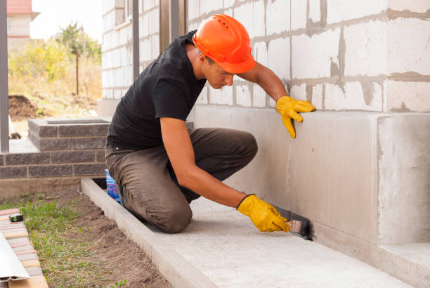 Waterproofing professionals working in Utica, IN